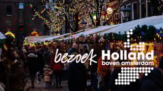 Bezoekolland boven Amsterdam